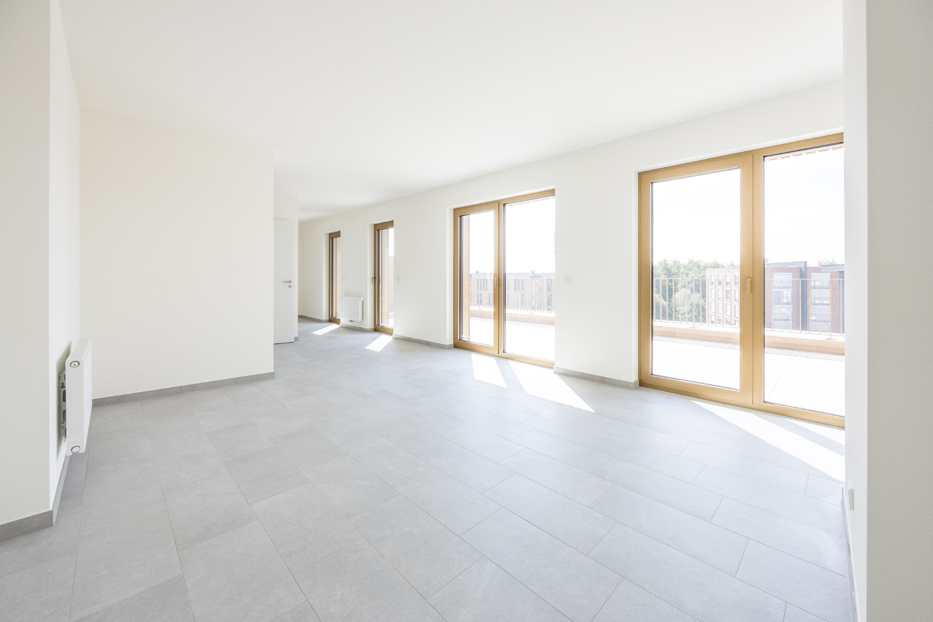 Résidence Réimerwee — séjour lumineux avec accès terrasse